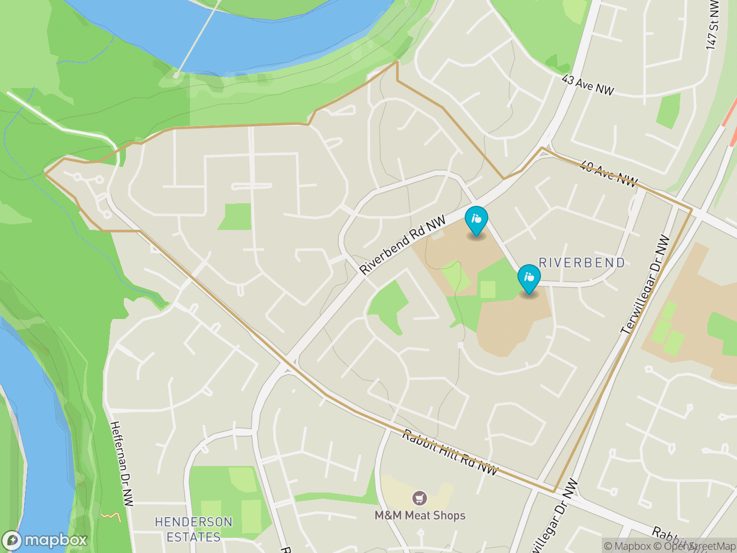 Map of Rhatigan Ridge, Edmonton — neighbourhood boundary, 2 schools, parks and surrounding streets.
